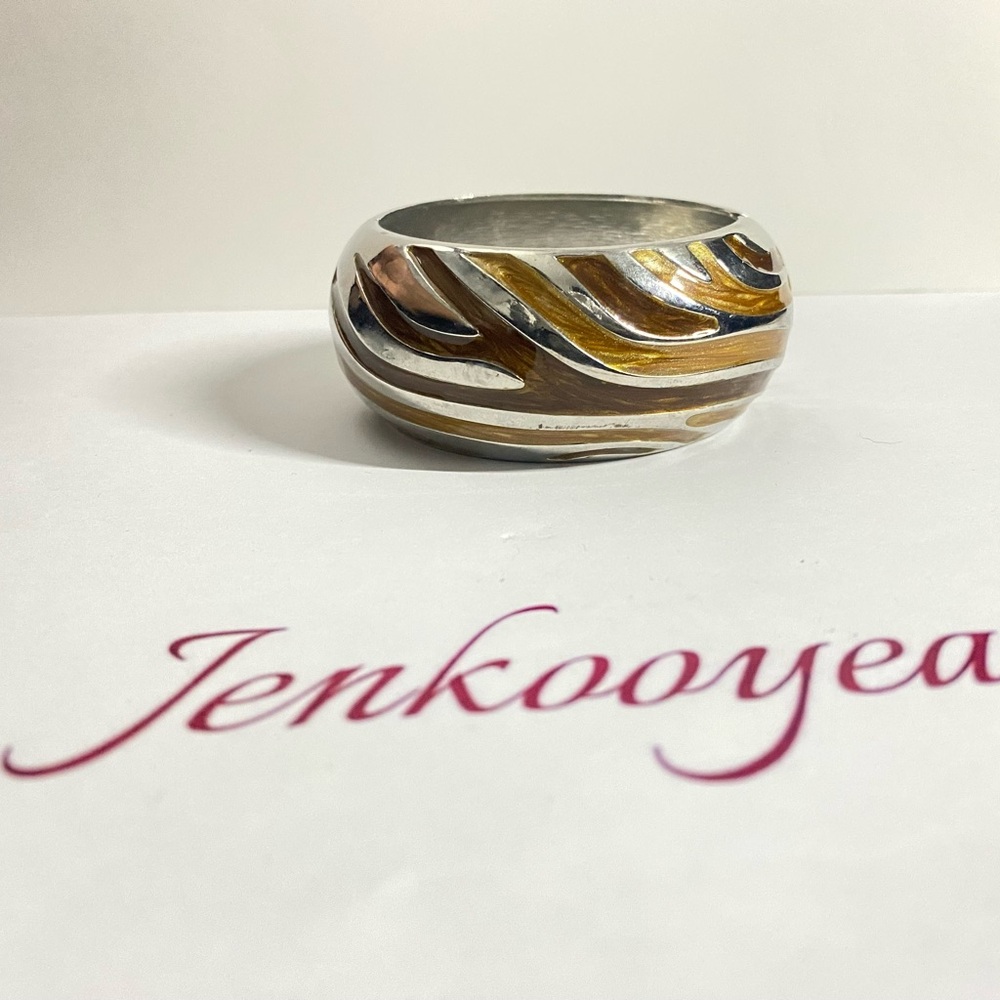 Elegant Silver and Gold Swirl Bangle Bracelet